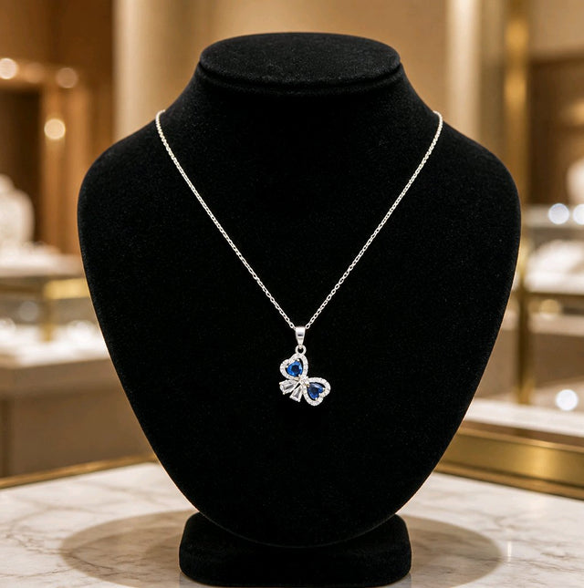 NNPN024 – ZYN Sapphire Bow Necklace
