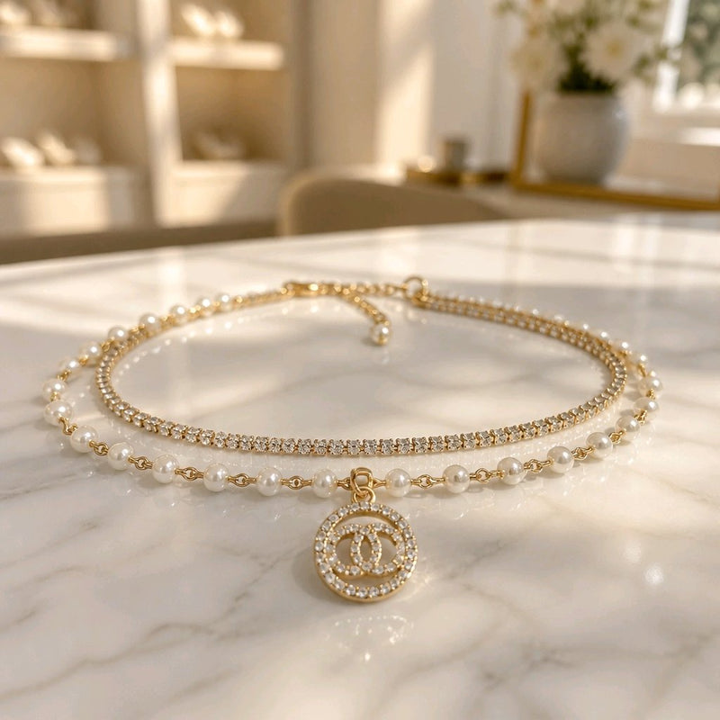 NNCB033 – ZYN Crystal Pearl Interlock Charm Bracelet