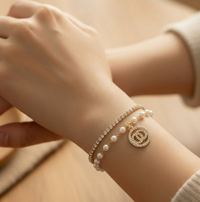NNCB033 – ZYN Crystal Pearl Interlock Charm Bracelet