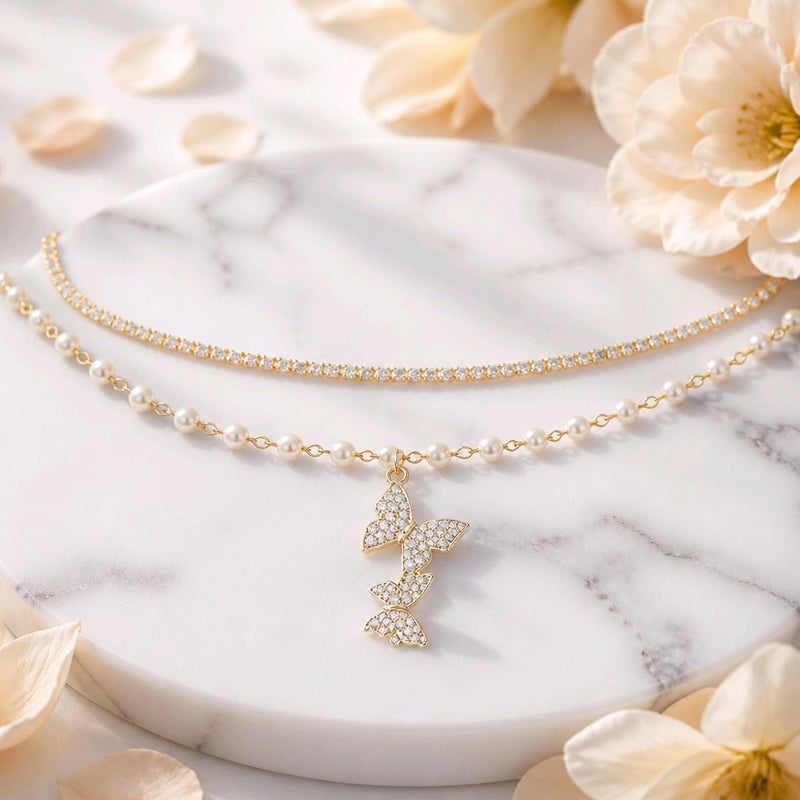 NNCB036 – ZYN Pearl Butterfly Charm Bracelet