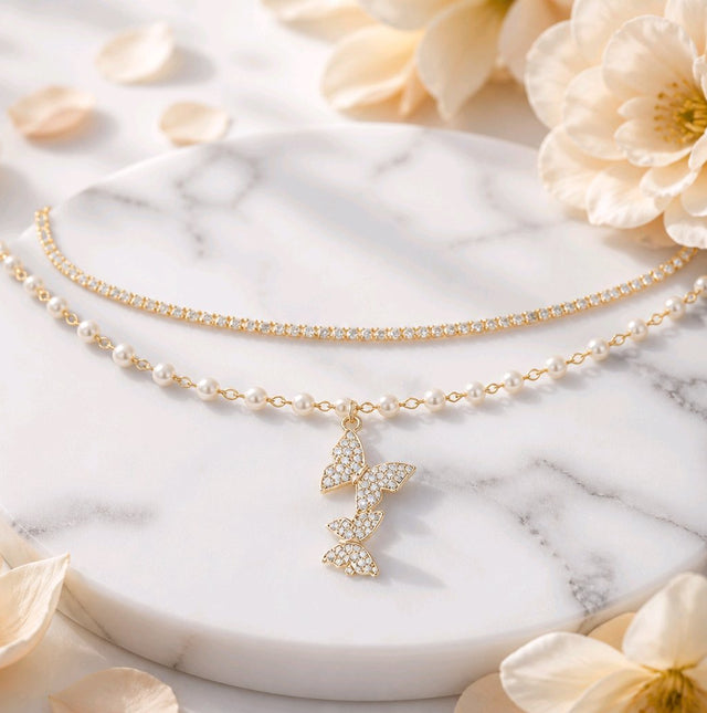 NNCB036 – ZYN Pearl Butterfly Charm Bracelet