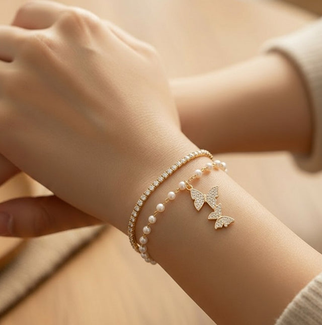 NNCB036 – ZYN Pearl Butterfly Charm Bracelet